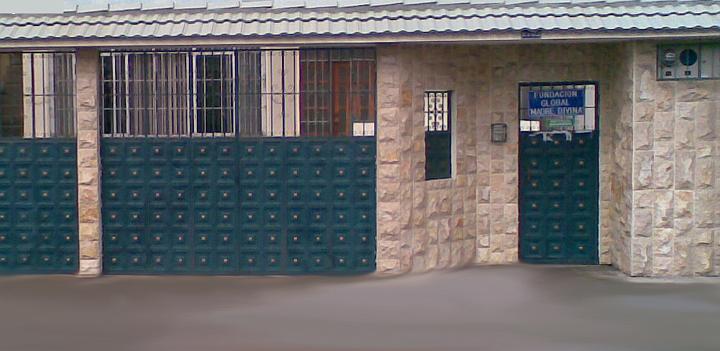 50 ecuador.jpg - Ecuador: The Global Mother Divine Organization established a spacious and comfortable set of offices and meeting rooms from which they can work and will be designing a school project to create the 400 Sidhas necessary to bring Invincibility to Ecuador. The sign on the door: 'Fundacion Global Madre Divina' is the Global Mother Divine Foundation.